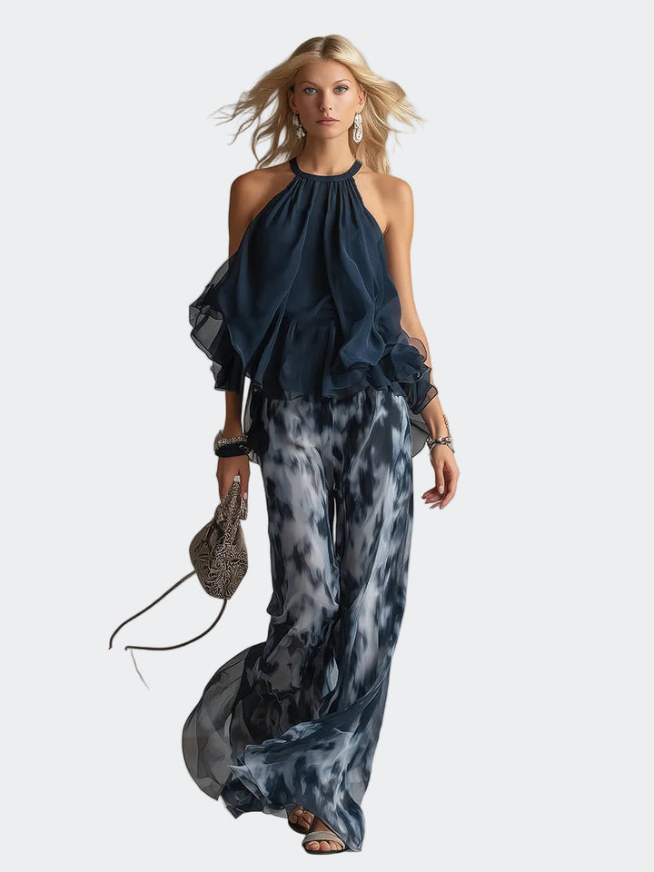 Ludovica - elegantna u chiffon s topom s visokim ovratnikom i širokim hlačama s uzorkom
